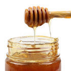 Scalpore di legno naturali Antivari del miele di Antivari del miele di confusionario del cucchiaio della spruzzata di legno del miele
