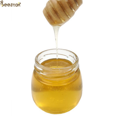 comprare Miele di fiore Wubei all'ingrosso 100% miele d'api naturale con colore ambra chiaro 18,7% umidità e 73,4% riduzione dello zucchero fabbricazione online