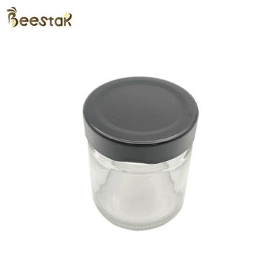comprare bottiglia di 250ml Honey Jar And Spoon Glass per Honey Packaging fabbricazione online