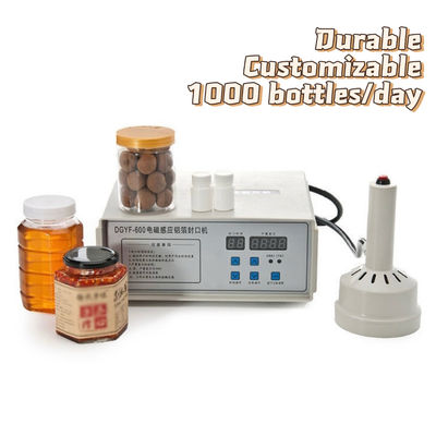 Mini Manual Electromagnetic Induction Sealing Machine with 100-500W Adjustable Power and Copper Coil for 20-130mm Applicable Caliber