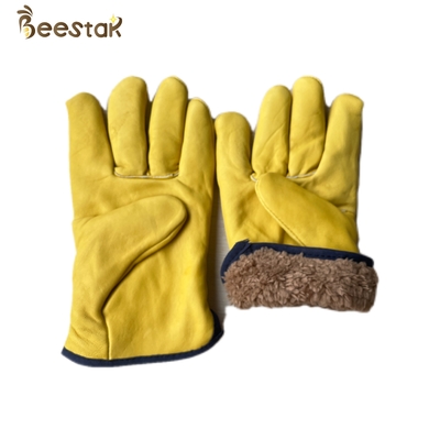 Guanti spessi di apicoltura di inverno della pelle di pecora della pelle scamosciata del vello gialli per l'apicoltore