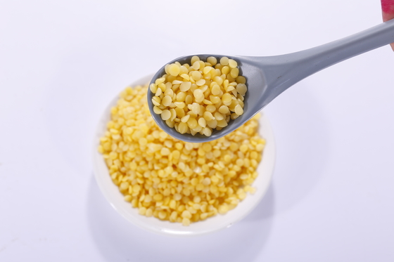 La cera d'api gialla pura di 100% appallottola la cera bianca del granello per alimento e l'industria cosmetica
