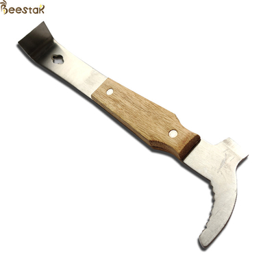 Strumenti dell'alveare di apicoltura di acciaio inossidabile del bene durevole di alta qualità con la maniglia di legno per l'alveare