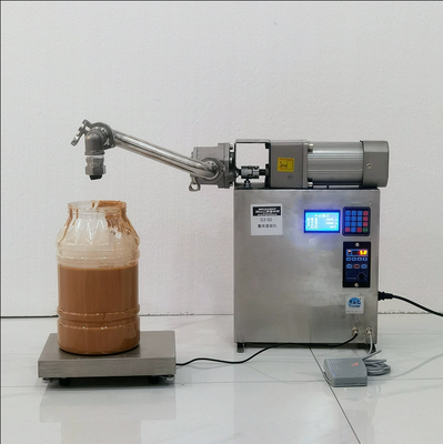 Macchina di riempimento liquido in acciaio inossidabile 304 con velocità di 16 kg/min e potenza di 300W